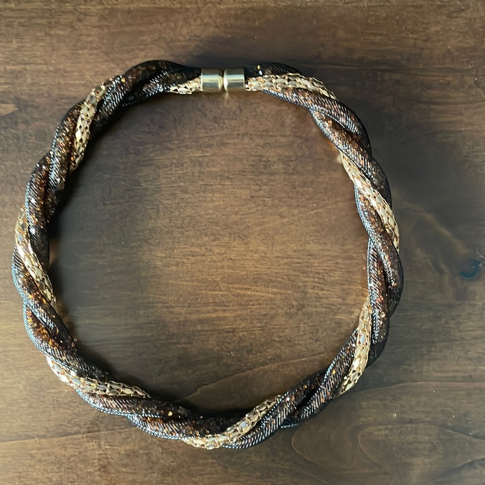 Brown and gold colored necklace